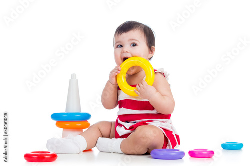 happy baby girl playing wit...