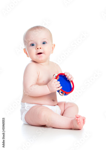 Baby girl playing musical t...