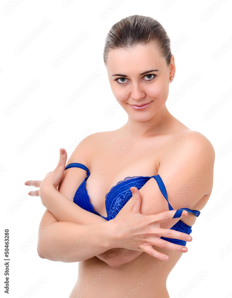young woman takes off bra Stock Photo