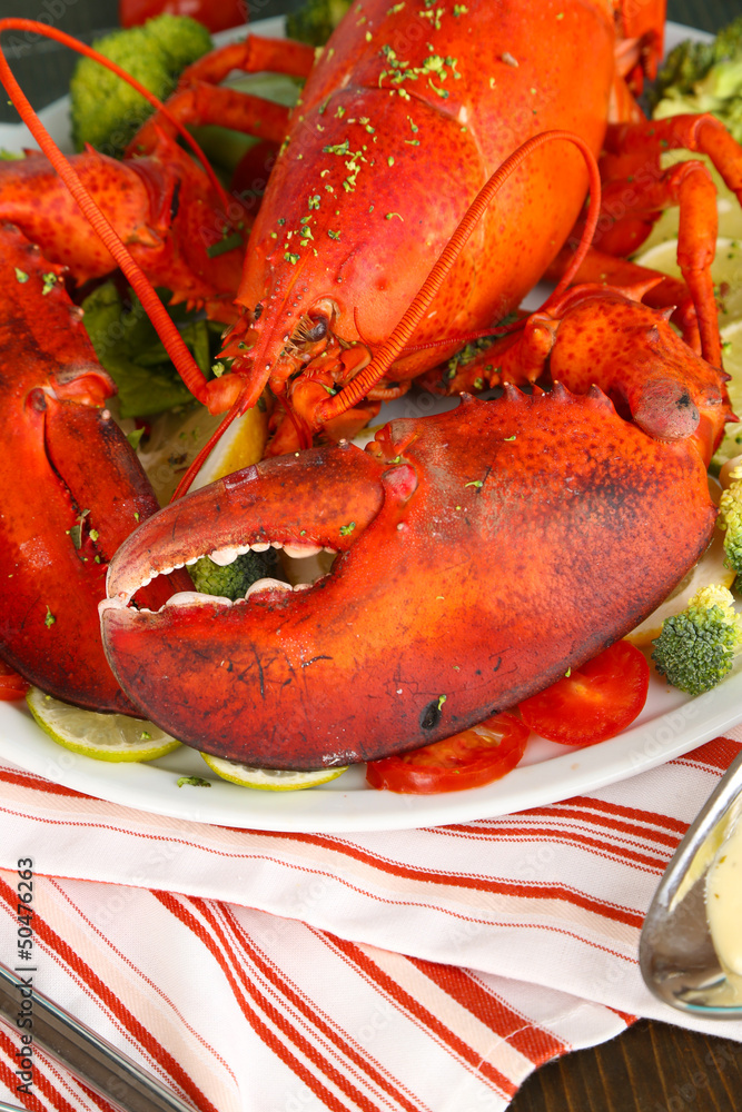 Red lobster on platter on table close-up Red lobster on platter on table close-up