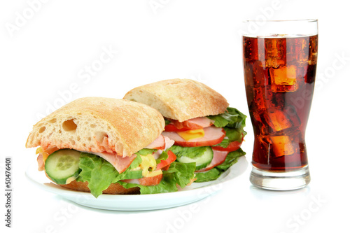 Tasty ham sandwich and glass of cola with ice isolated on white