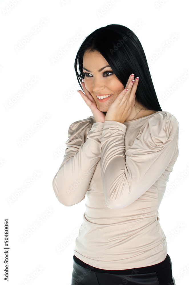 Beautiful brunette with hands to her face Beautiful brunette with hands to her face