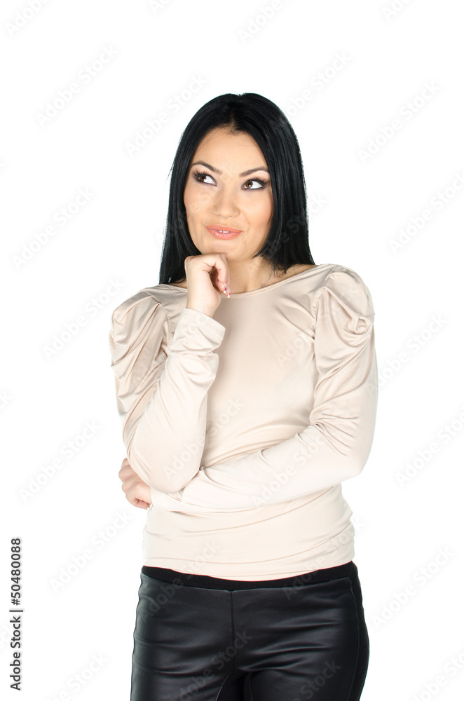 Beautiful brunette with one hand to her chin Beautiful brunette with one hand to her chin