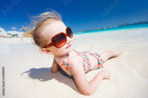 Little girl on a beach vacation