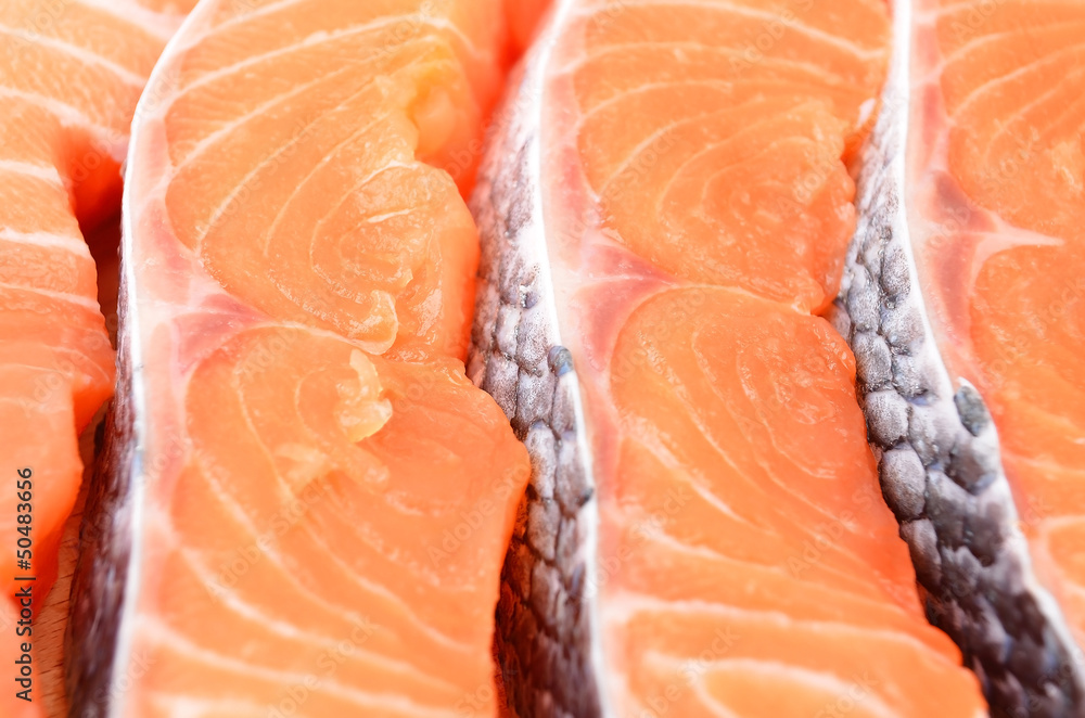 Fresh salmon steak sliced, close up, DOF