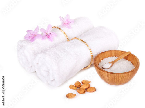 spa items: flowers with towels and salt isolated