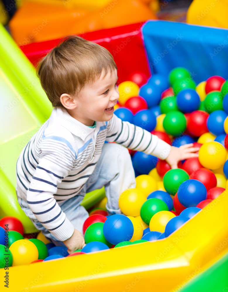 Obraz premium Little boy on playground