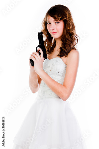 Young and beautiful woman with a gun