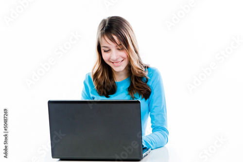 smart and beautiful girl working on a laptop © korvin1979