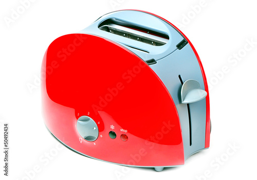 Modern red toaster isolated over white