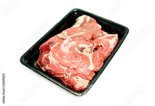 fresh beef on plastic plate from supermarket