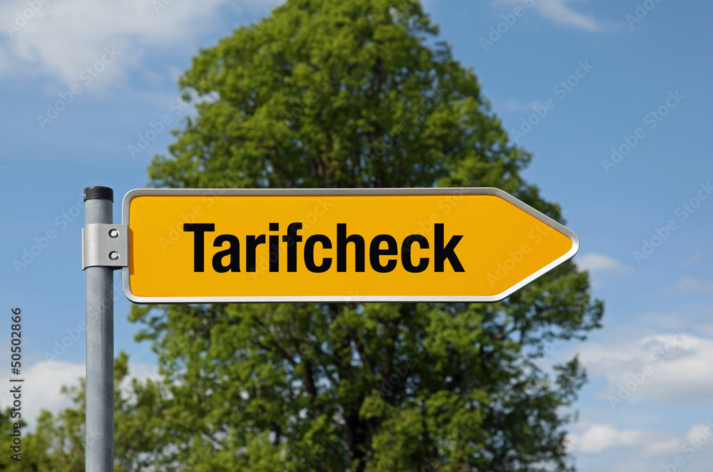 Fototapeta premium Gelber Pfeil mit Baum TARIFCHECK