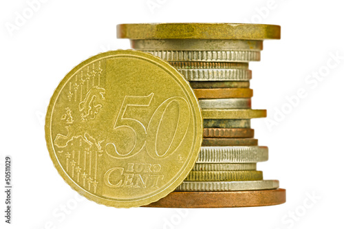 Coin pile with fifty cent euro isolated on white background photo