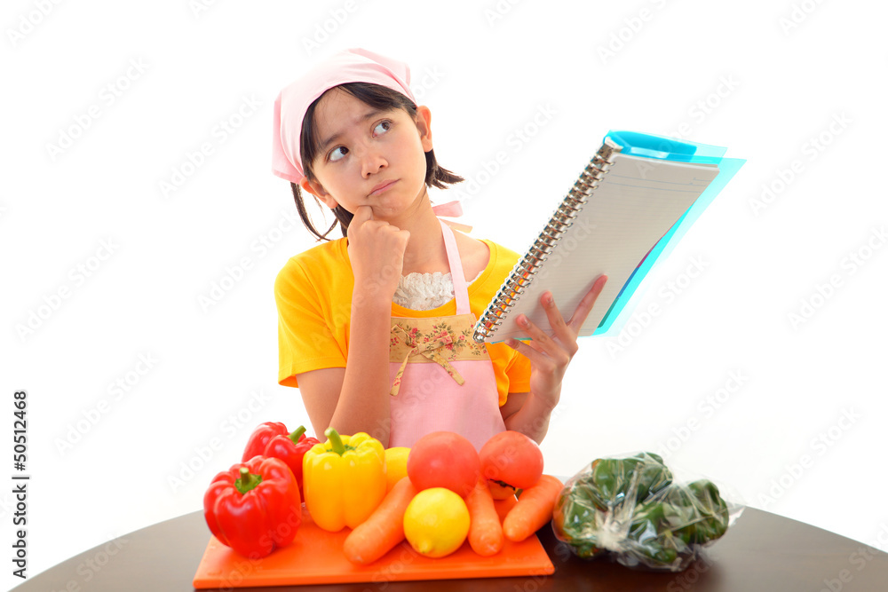 料理にチャレンジする女の子