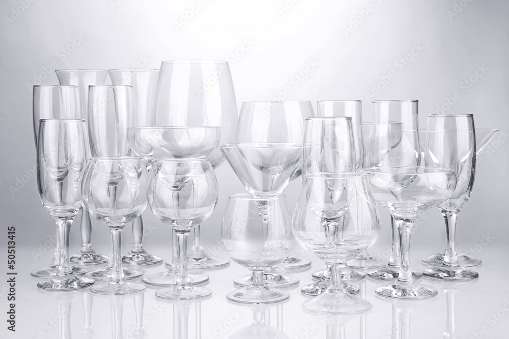 Cocktail and wine glasses, on gray background Cocktail and wine glasses, on gray background