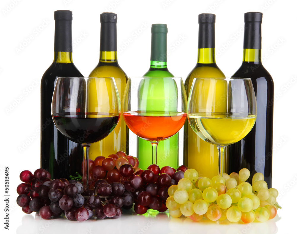 Assortment of wine in glasses and bottles isolated on white Assortment of wine in glasses and bottles isolated on white