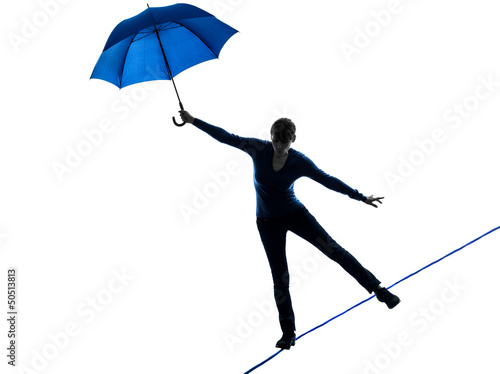 Foto woman holding umbrella silhouette