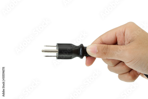 Power plug in a hand on a white background