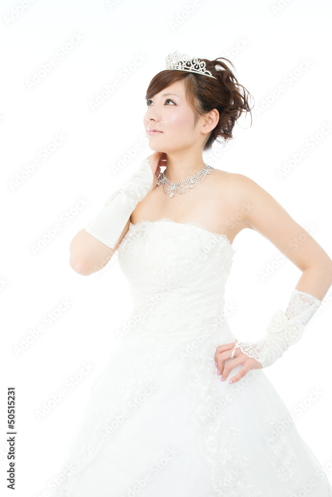 Beautiful asian woman dressed as a bride on white background Beautiful asian woman dressed as a bride on white background
