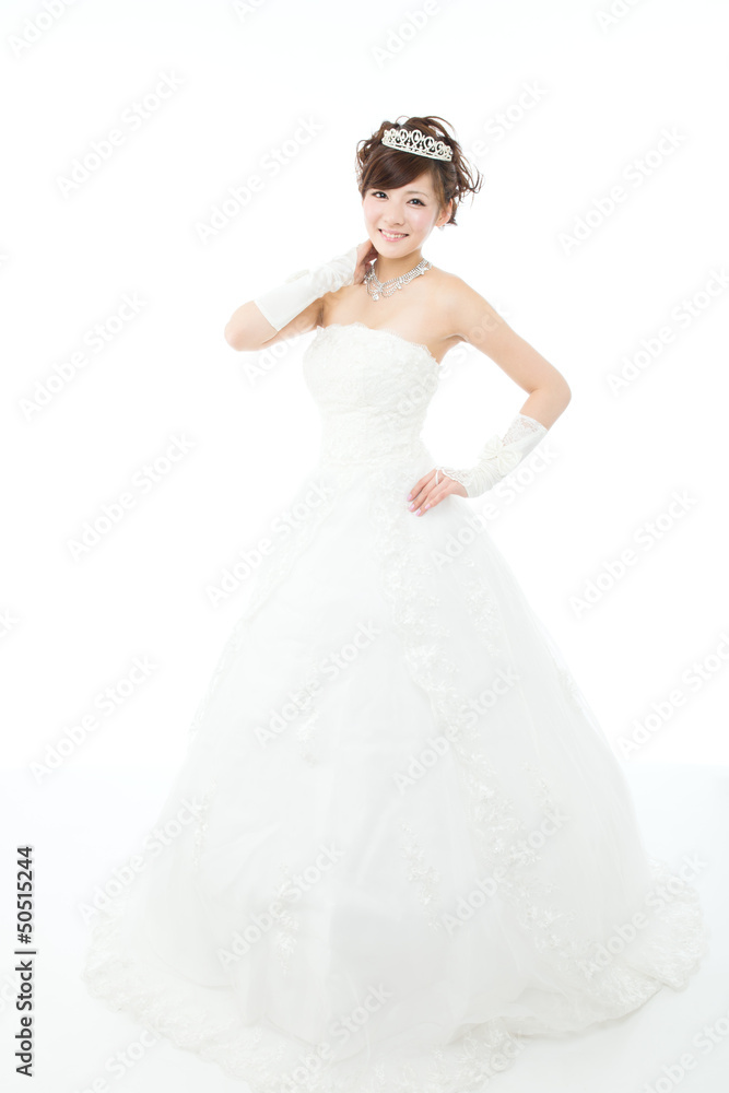Beautiful asian woman dressed as a bride on white background Beautiful asian woman dressed as a bride on white background