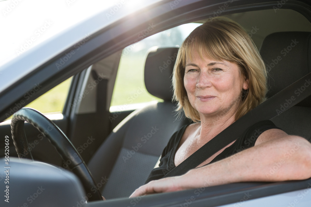 Portrait of senior woman in car Portrait of senior woman in car