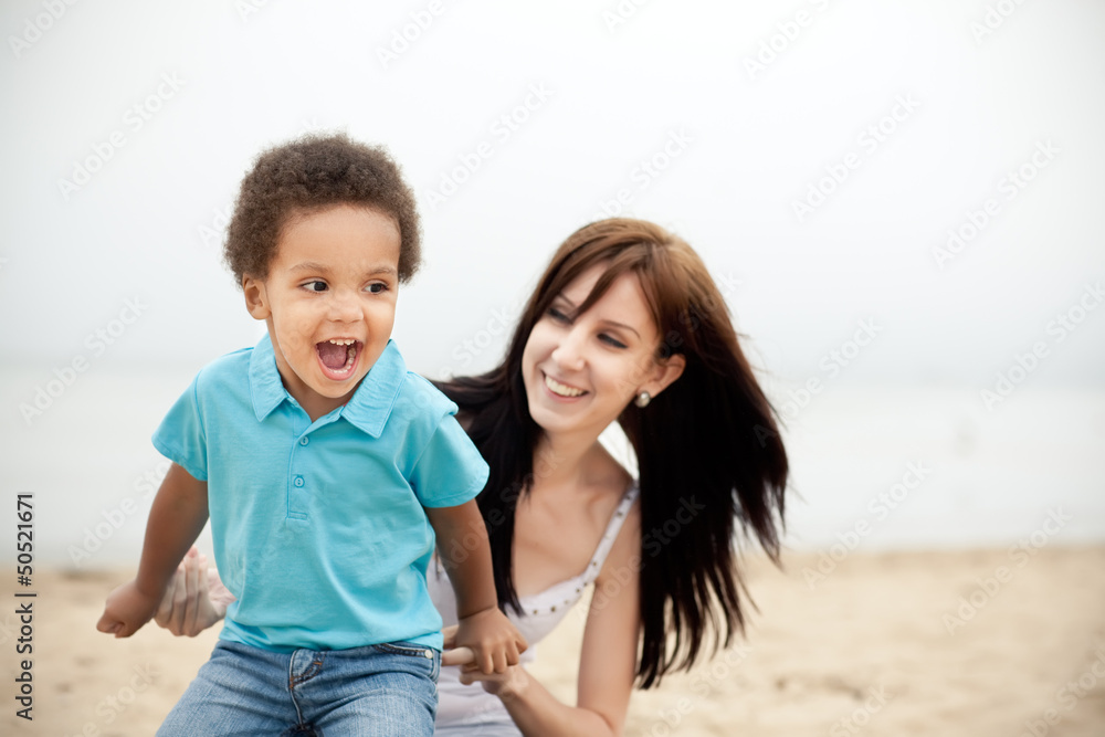 Multi-Ethnic family relaxing together outdoors Multi-Ethnic family relaxing together outdoors
