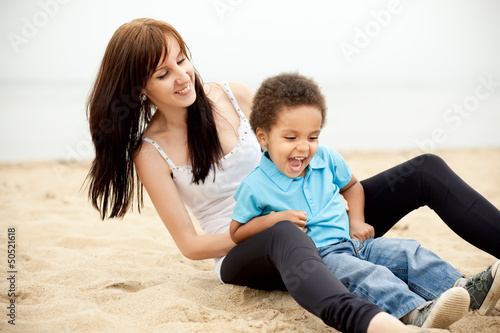 Multi-Ethnic family relaxing together outdoors