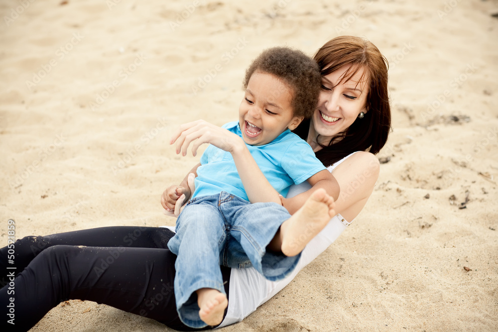 Multi-Ethnic family relaxing together outdoors Multi-Ethnic family relaxing together outdoors