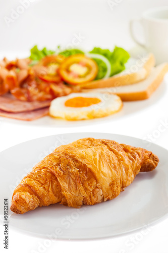 croissant and American Breakfast on white background