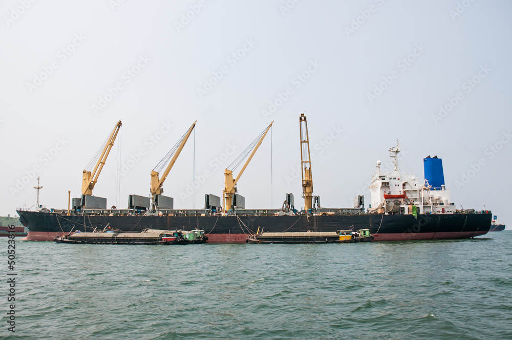 cargo ship with crane