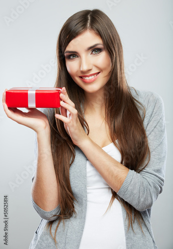 Young woman portrait hold gift in christmas color style