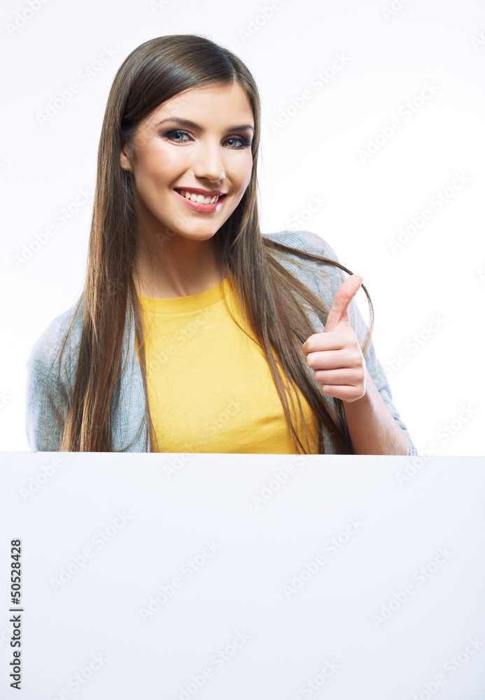 Smiling woman leaning on big blank board . Smiling woman leaning on big blank board .