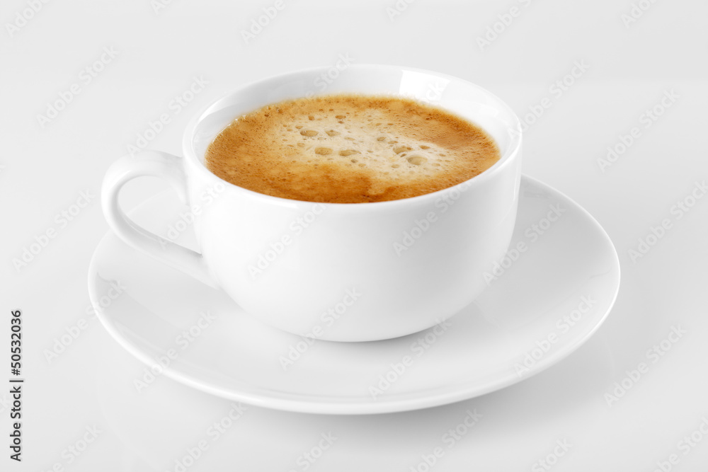 A cup of delicious espresso coffee on a white background A cup of delicious espresso coffee on a white background