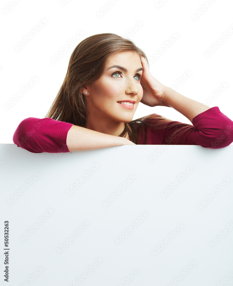 Smiling woman leaning on big blank board . Close up female face Smiling woman leaning on big blank board . Close up female face
