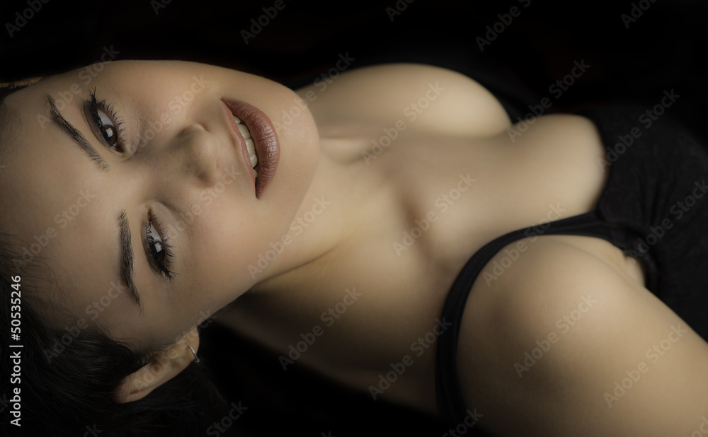 Portrait of a beautiful brunette woman. Fashion model posing at Portrait of a beautiful brunette woman. Fashion model posing at