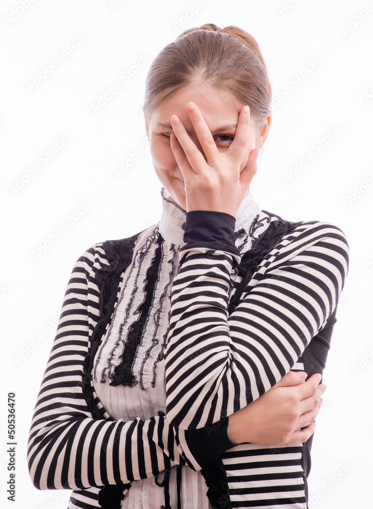 Woman Peaking Through Hands on her face Woman Peaking Through Hands on her face