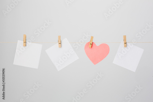 Three White Notes and One Heart-shaped Note