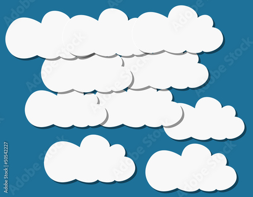 patterns of clouds of paper against the sky