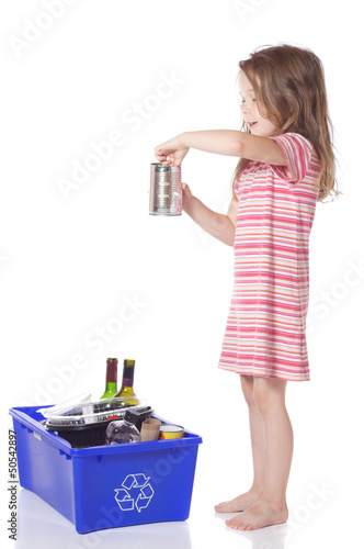 Young girl recycling