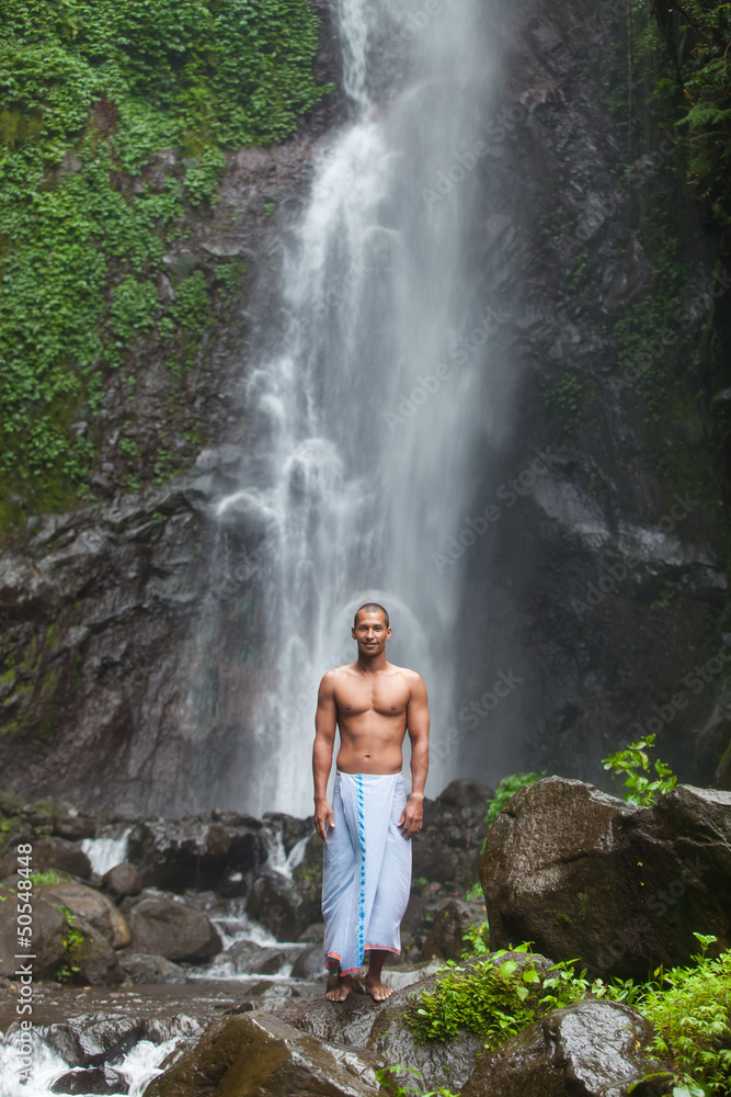 Handsome man at waterfall Handsome man at waterfall