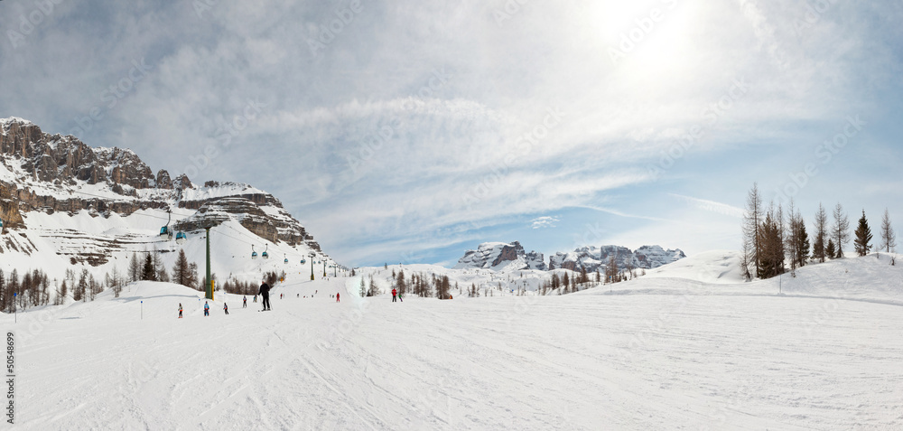 Panorama of wintersport snow mountian landscape with ski tourist Panorama of wintersport snow mountian landscape with ski tourist