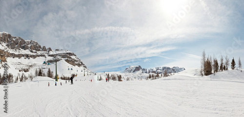 Panorama of wintersport snow mountian landscape with ski tourist