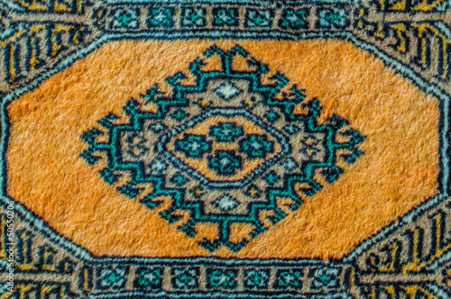 Colorful Persian carpet with beautiful patterns.