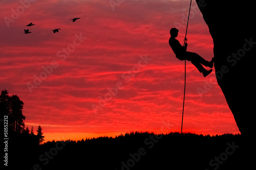 Rock Climber Rappelling Silhouette © photoexpert117