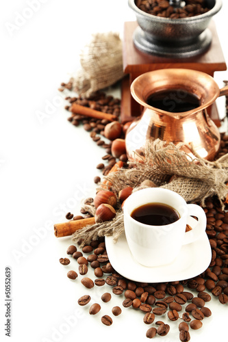 Cup and pot of coffee and coffee beans, isolated on white