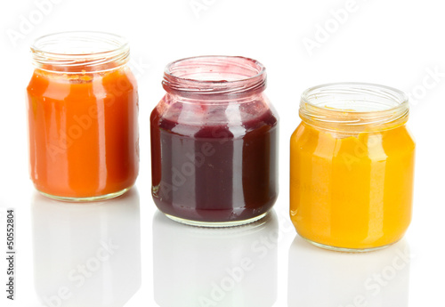 Baby puree in jars isolated on white