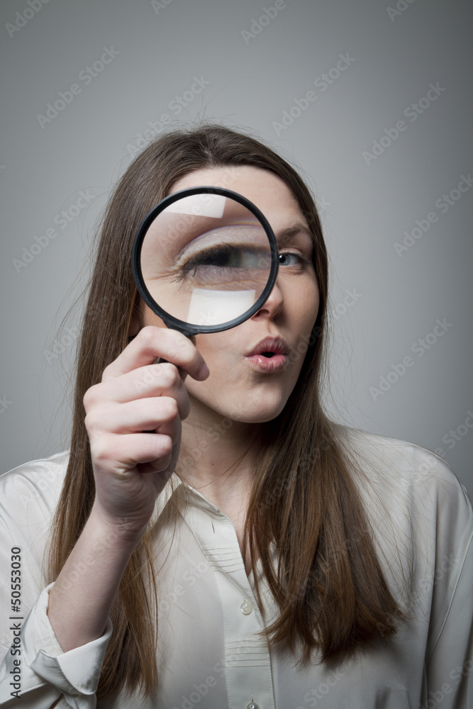 Woman with magnifier Woman with magnifier