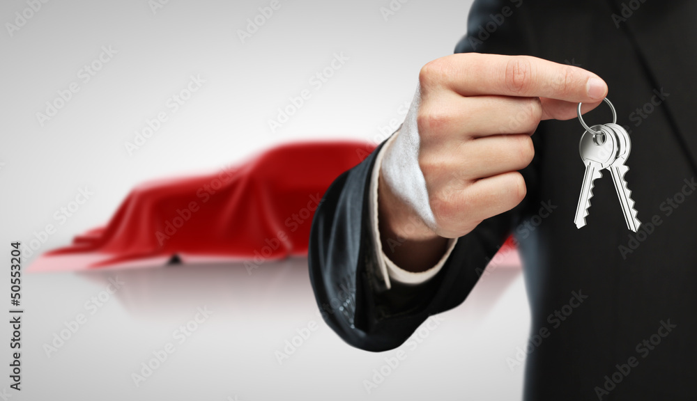Fototapeta premium men holding keys