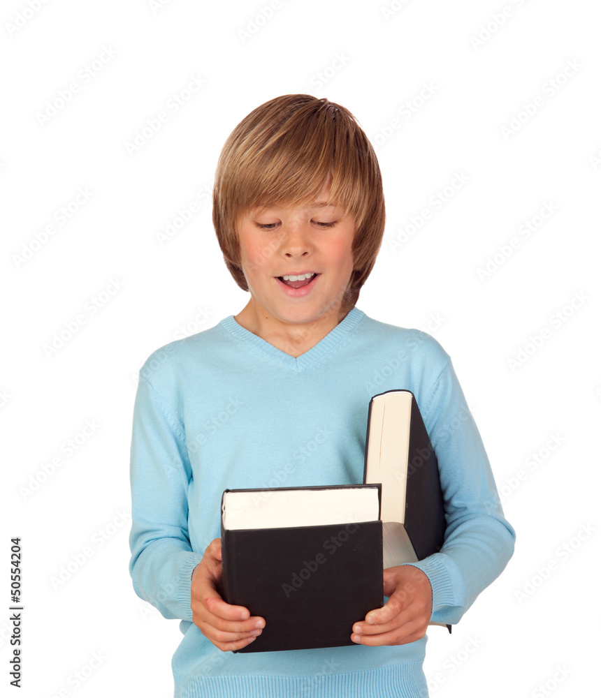 Obraz premium Surprised preteen boy with a book