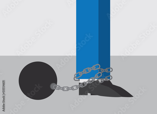 Business Worker with ball and chain attached to foot